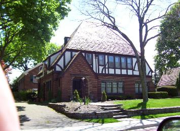 Exterior painting of this tudor stucco home in canton ohio by northcoast painting and pressure washing